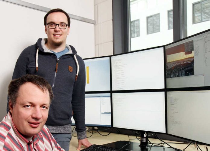 Dr. Thomas Kuhn (vorne links) und Matthias Jung Dr. Thomas Kuhn (vorne links) und Matthias Jung