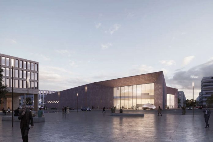 Das Büro DEGELO Architekten aus Basel sieht für das Konferenzzentrum in der Bahnstadt ein architektonisch markantes Gebäude mit einer rötlich gefärbten Fassade vor. Vom Bahnhofsplatz Süd aus bietet sich ein freier Blick auf den Bereich des Haupteingangs. (Foto: DEGELO Architekten)