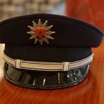 Symbolbild Polizeimütze (Foto: Reinhard Schnell)